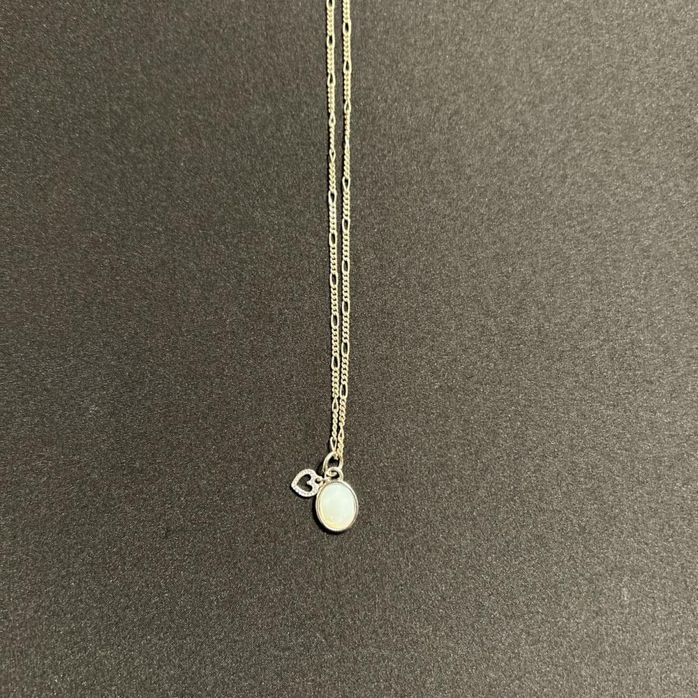 Elegant Silver Necklace with White Pendant